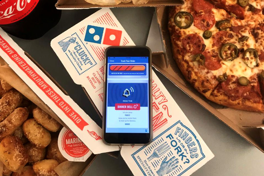 Domino's Pizza boxes and mobile app