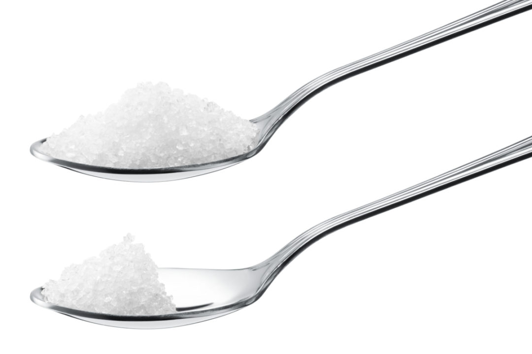 One spoon with more sugar, one with less sugar