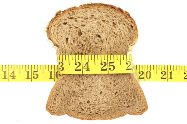 Whole grain bread and measuring tape