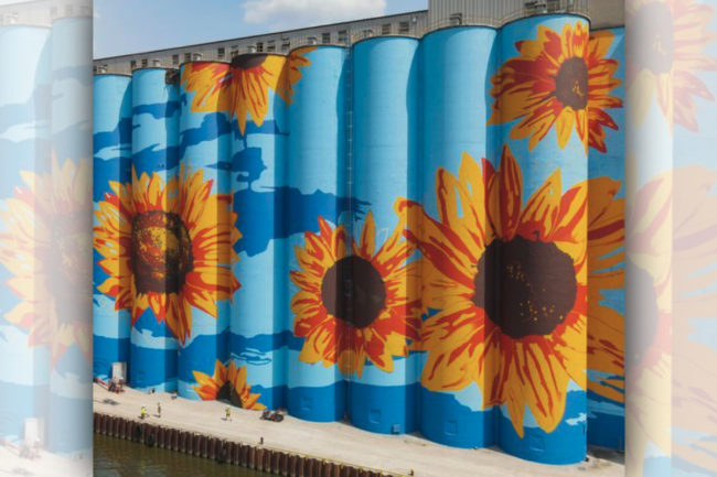 ADM Glass City River Wall painted with sunflowers