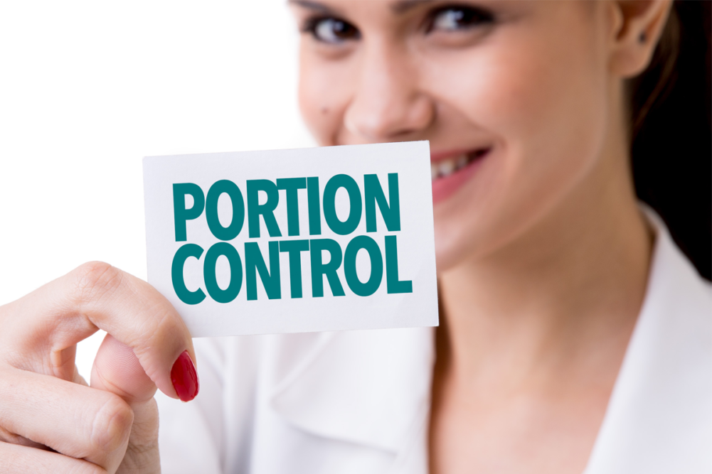 Woman holding portion control card