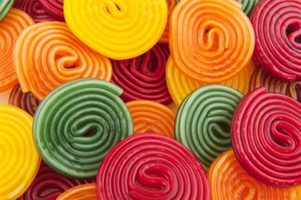Green, red, orange and yellow candy swirls