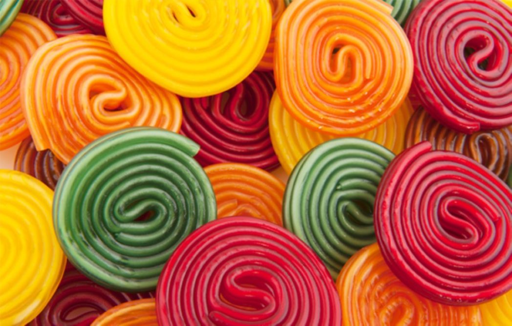 Green, red, orange and yellow candy swirls