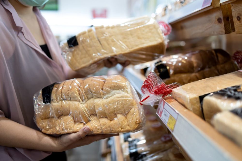 Sliced bread, grocery store bakery, grocery shopper, Adobe Stock