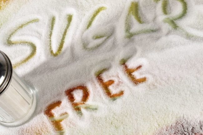 "Sugar free" written in spilled sugar