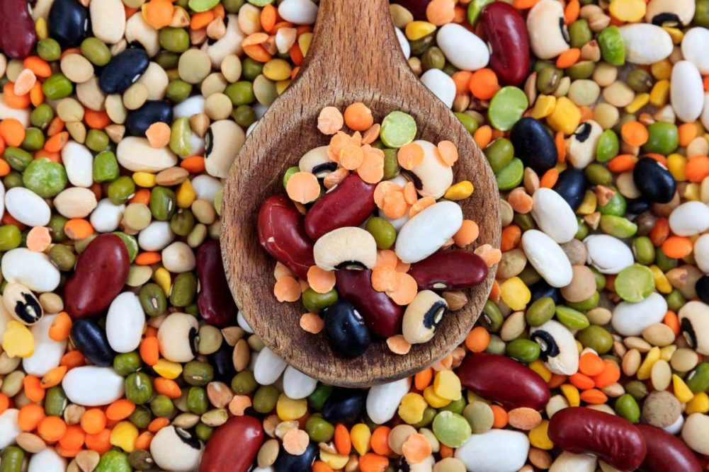 Dried beans and lentils, legumes, wooden spoon