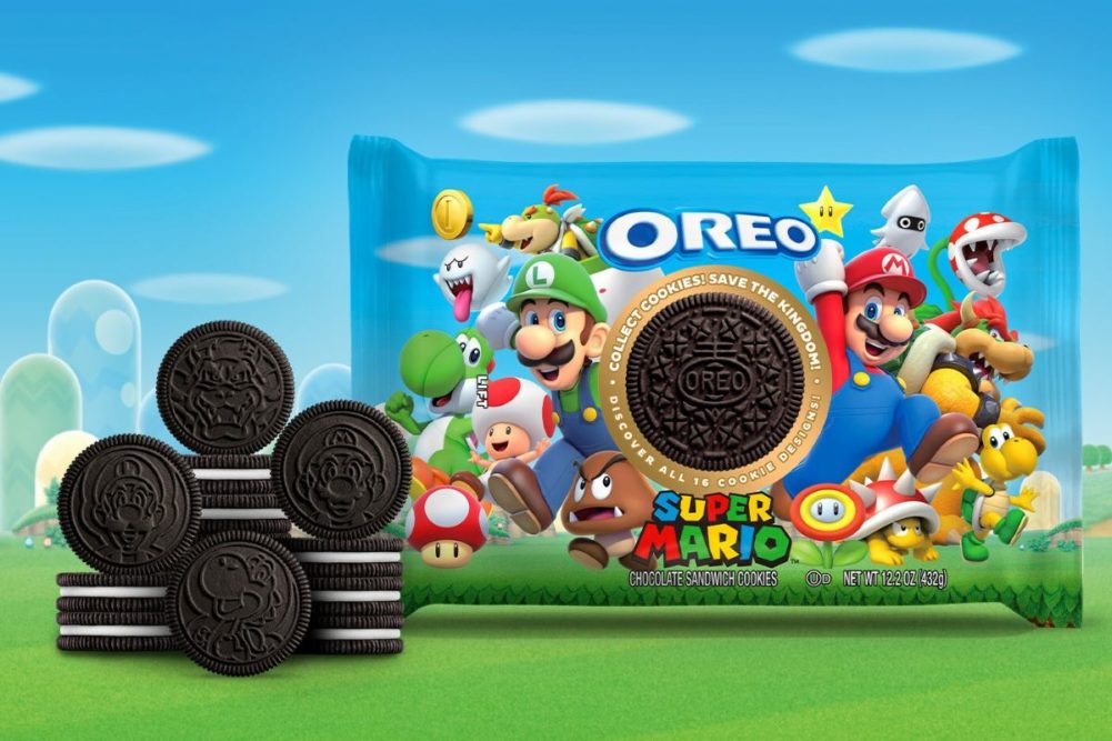 A stack of Oreo cookies next to a package of Super Mario themed cookies
