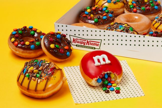 Assortment of Krispy Kreme donuts with M&M's