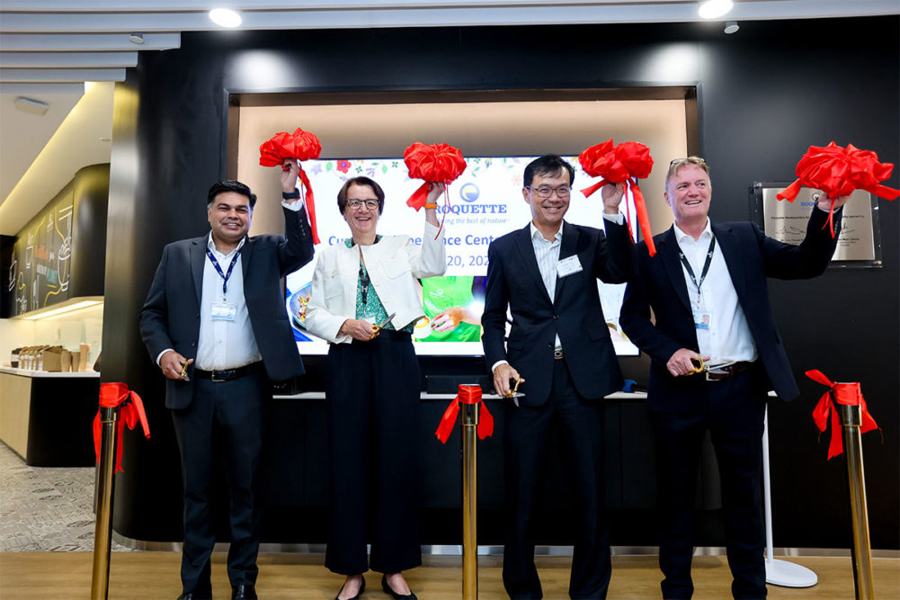 Four Roquette workers unveil new customer experience center in Singapore. 