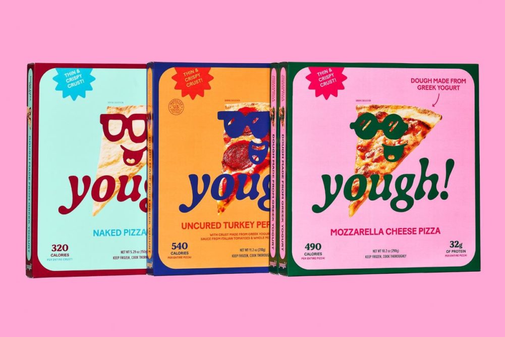 Assortment of Yough frozen pizzas in front of pink background. 