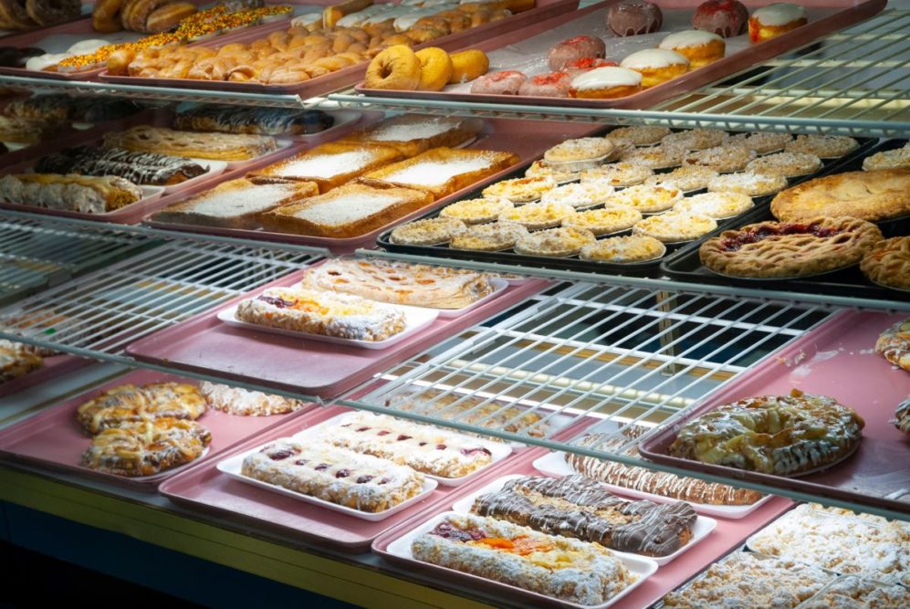 Assortment of different donuts and pastries. 