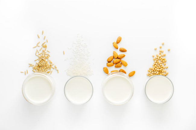 Assortment of plant-based milks. 