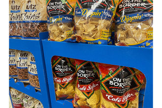 Assortment of Utz products in grocery store. 