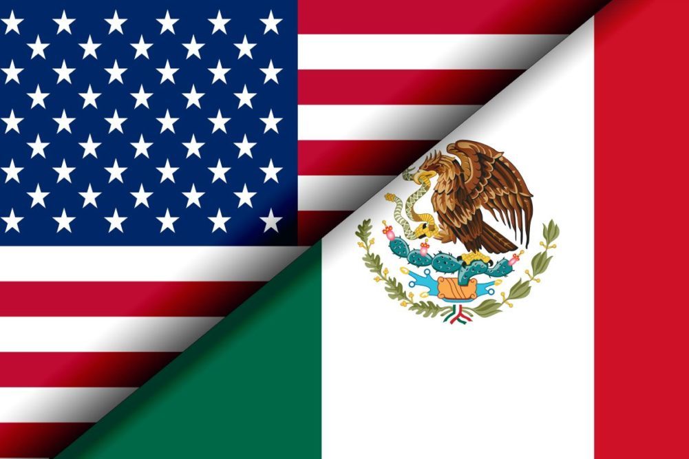 U.S. and Mexico flags.