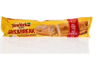 A roll of New York Bakery frozen garlic bread. 