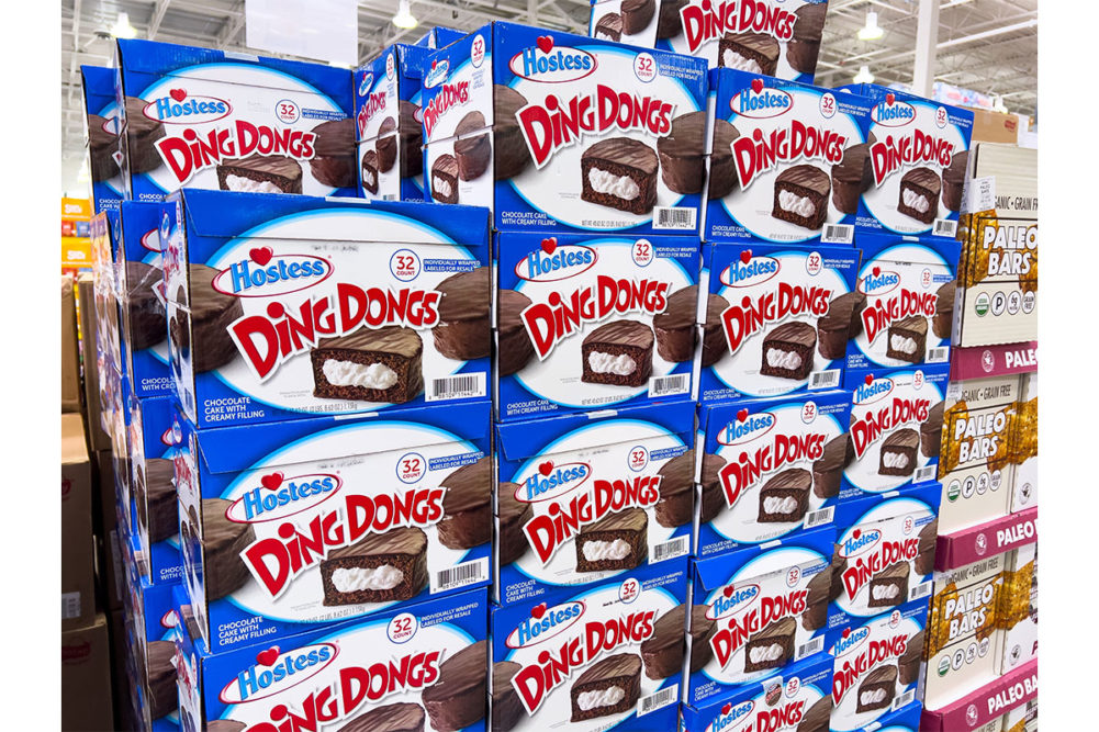 A large stack of Hostess Ding Dongs at Costco. 