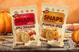 Stauffers Biscuit Co. Fall SNAPS surrounded by pumpkins and cinnamon. 