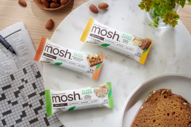 Assortment of MOSH protein bars on table. 