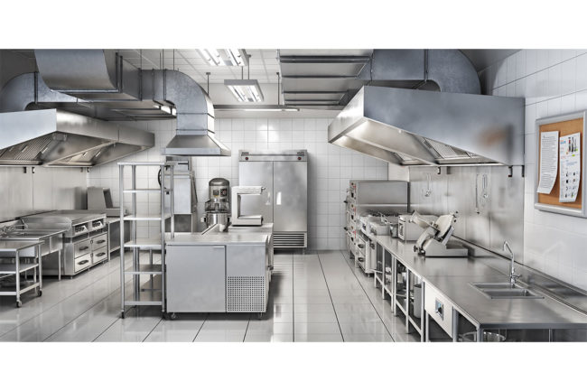 Large, stainless steel industrial kitchen. 