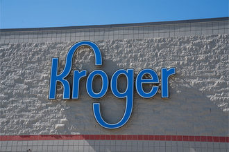 Blue Kroger logo on storefront. 