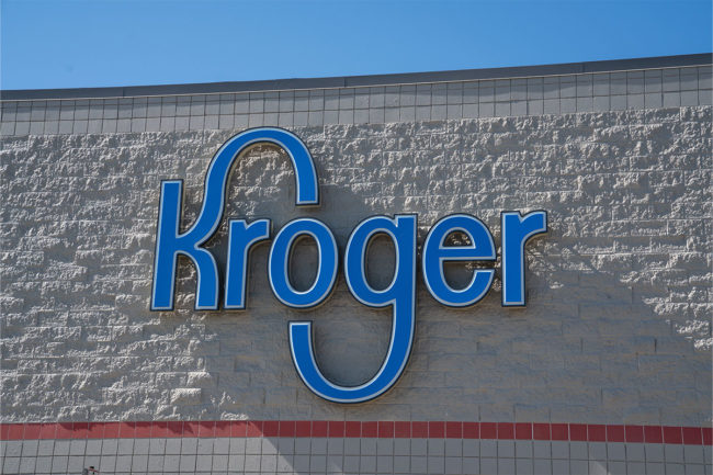 Blue Kroger logo on storefront. 