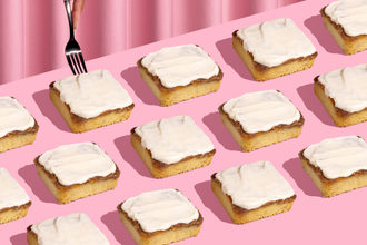 New Crumbl cinnamon squares on pink background.