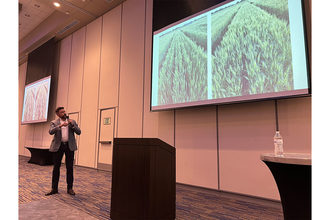 Romulo Lollato, an associate professor and Kansas State University research and extension wheat specialist, speaks on the effects of contrasting management practices on wheat quality and yield on Feb. 22 in Olathe, Kan. 