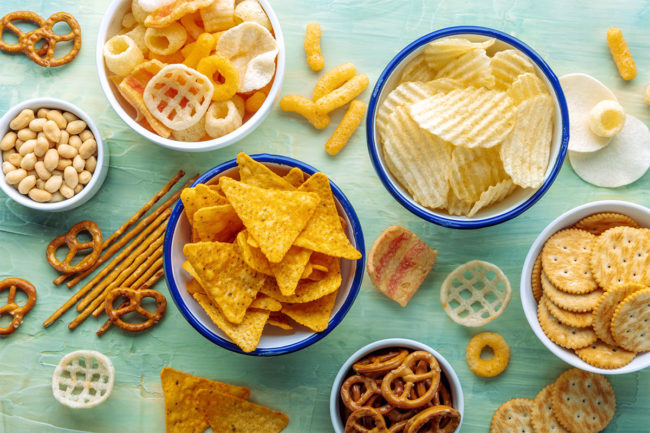 Assortment of salty snacks & chips.