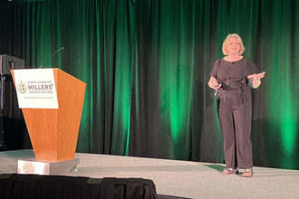 Erin Ball, executive director of the Grain Foods Foundation updates NAMA spring conference attendees on ultra-processed foods.