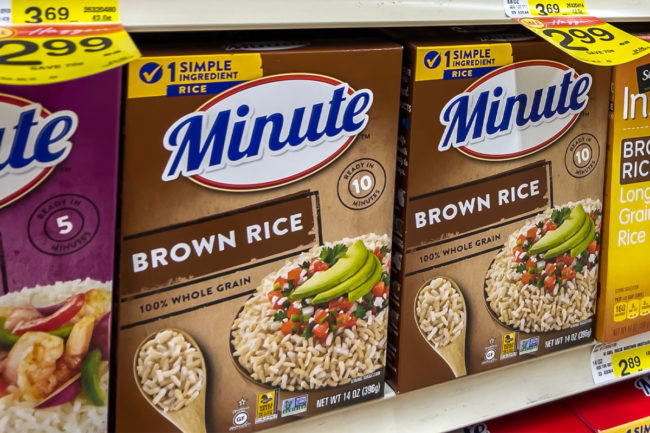 Minute rice on grocery store shelf. 