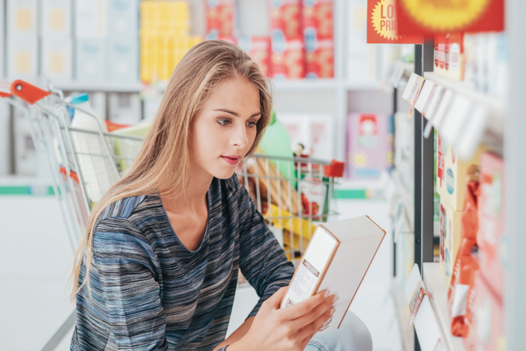Woman reading nutrition label